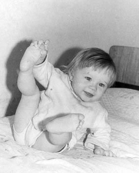 a black and white photo of a child