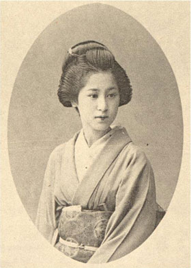 Old black and white portrait of a geisha